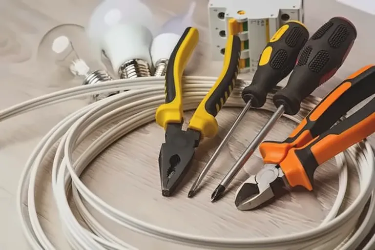 Electrical wiring, bulbs, pliers and screwdrivers